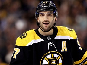 Patrice Bergeron of the Boston Bruins looks on during Game 2 against the Toronto Maple Leafs at TD Garden on April 14, 2018