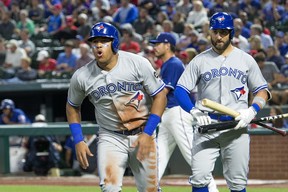 Toronto Blue Jays' Yangervis Solarte celebrates after scoring on a sacrifice fly by Kendrys Morales during the third inning of a baseball game against the Texas Rangers on Friday, April 6, 2018, in Arlington, Texas. (AP Photo/Jeffrey McWhorter) ORG XMIT: ARL110