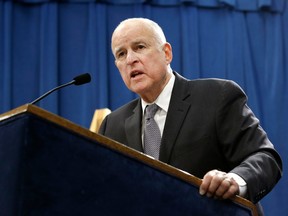 California Gov. Jerry Brown responds to a question at a news conference in Sacramento, Calif. Gov. Brown on Friday, March 30. (AP Photo/Rich Pedroncelli File)