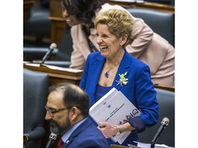 Ontario Premier Kathleen Wynne after Ontario Finance Minister Charles Sousa (not pictured) delivered the provincial budget at the Ontario Legislature in Toronto, Ont. on Wednesday March 28, 2018. Ernest Doroszuk/Toronto Sun/Postmedia Network ORG XMIT: POS1803281656511727
