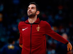 In this March 7, 2018 photo, Cleveland Cavaliers guard Jose Calderon warms up in the first half of an NBA game in Denver