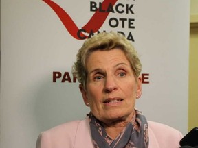 Premier Kathleen Wynne is questioned after Wednesday night's debate. (ANTONELLA ARTUSO, Toronto Sun)