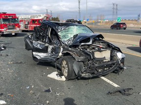 A vehicle damaged in a collision on Hwy. 401 at Winston Churchill on Thursday, April 19, 2019. (OPP_HSD)