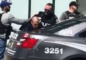 Toronto Police make an arrest after Monday’s van attack.