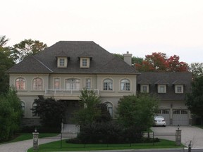 This Vaughan mansion is one of two houses purchased with the $12.5-million winnings from a 2004 lottery fraud involving Jun-Chul Chung, his son, Kenneth Chung, and daughter, Kathleen Chung.