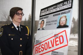 Barrie Police Chief Kim Greenwood stands beside photos of two men who vanished after leaving a Toronto bar in 1991. An Elmvale man is now charged with their murders, OPP revealed on Wednesday, April 18, 2018.
