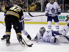Maple Leafs goaltender Frederik Andersen sprawls, but cannot stop a goal by Bruins right wing David Backes (42) during the Game 1 of their NHL playoff series in Boston, Thursday, April 12, 2018. (Elise Amendola/AP Photo)