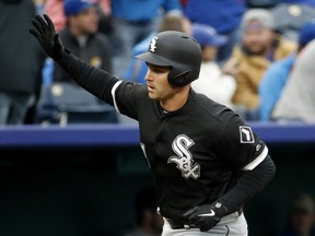 Chicago White Sox's Matt Davidson celebrates as he rounds the bases after hitting a three-run home run during the eighth inning of a baseball game against the Kansas City Royals, Thursday, March 29, 2018, in Kansas City, Mo. (CHARLIE RIEDEL/AP)