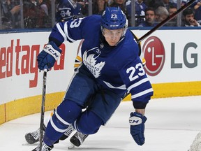 Maple Leafs defenceman Travis Dermott carries the puck during Game 4 against the Boston Bruins. (Claus Andersen/Getty Images)