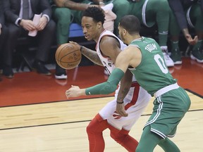 Toronto Raptors guard DeMar DeRozan and Boston Celtics forward Jayson Tatum in Toronto on April 4, 2018