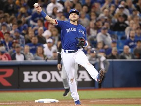 Josh Donaldson of the Toronto Blue Jays throws to first during MLB action against the Chicago White Sox at Rogers Centre on April 3, 2018 in Toronto. (Tom Szczerbowski/Getty Images)