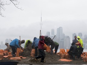 The nasty weekend weather ahead has raised concerns about flooding, which last year caused major problems for the Toronto Islands and along the city's waterfront. City workers and Islanders are seen filling sandbags to slow the flooding on Wards Island on Thursday, May 4, 2017.