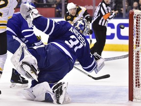 Maple Leafs goaltender Frederik Andersen (31) makes a lunging save during against the Boston Bruins in Toronto on Monday, April 16, 2018. (THE CANADIAN PRESS/Frank Gunn)