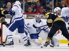 Boston Bruins' Patrice Bergeron (37) tries to shoot against Toronto Maple Leafs' Frederik Andersen (31), of Denmark, during the first period of Game 5 of an NHL hockey first-round playoff series in Boston, Saturday, April 21, 2018. (AP Photo/Michael Dwyer)