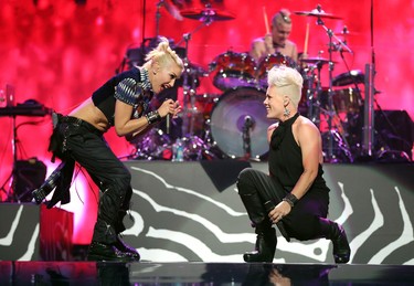 LAS VEGAS, NV - SEPTEMBER 21:  Singers Gwen Stefani (L) of No Doubt and Pink perform onstage during the 2012 iHeartRadio Music Festival at the MGM Grand Garden Arena on September 21, 2012 in Las Vegas, Nevada.  (Photo by Christopher Polk/Getty Images for Clear Channel)