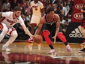 Kyle Lowry of the Toronto Raptors handles the ball against the Heat on April 11, 2018 at American Airlines Arena in Miami. (Photo by Isaac Baldizon/NBAE via Getty Images)