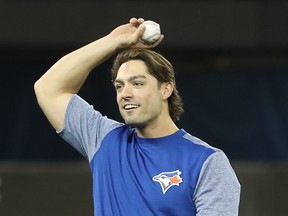 TORONTO, ON - MARCH 29: Randal Grichuk #15 of the Toronto Blue Jays warms up before the start of their MLB game  on Opening Day against the New York Yankees at Rogers Centre on March 29, 2018 in Toronto, Canada. (Photo by Tom Szczerbowski/Getty Images)