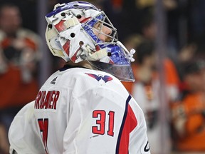 Philipp Grubauer of the Washington Capitals looks on after allowing a goal against the Philadelphia Flyers on March 18, 2018