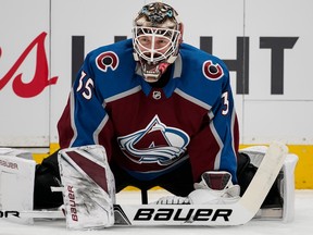 Colorado Avalanche goaltender Andrew Hammond stretches during warmups for Game 6 against the Nashville Predators on Sunday. (The Associated Press)