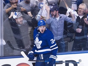 Toronto Maple Leafs centre Auston Matthews (34) reacts after scoring against the Boston Bruins during second period NHL, round one playoff hockey action in Toronto on Monday, April 16, 2018. THE CANADIAN PRESS/Nathan Denette