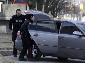 Toronto Police search the trunk of a car leaving 31 Gilder Dr. in Scarborough. A six-year-old girl, Jasmine Williamson, is missing.