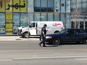 Toronto Police at the scene of the arrest of the accused van driver Alek Minassian on Poyntz Ave., April 23, 2018.