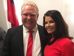 PC Leader Doug Ford and his wife Karla are all smiles in Hamilton on Tuesday, April 3, 2018. (JOE WARMINGTON/TORONTO SUN)
