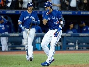 Toronto Blue Jays third baseman Josh Donaldson gestures to the Chicago White Sox dugout on April 2, 2018