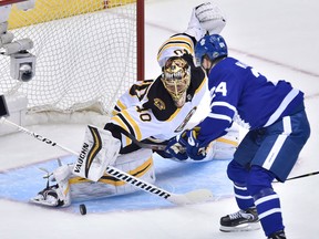 Boston Bruins goaltender Tuukka Rask stops Toronto Maple Leafs right winger Kasperi Kapanen during Game 3 on April 16, 2018