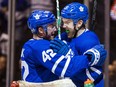 Toronto Maple Leafs forwards James van Riemsdyk and Tyler Bozak celebrate a goal during Game 3 against the Boston Bruins at the Air Canada Centre in Toronto on April 16, 2018