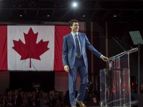 Prime Minister Justin Trudeau walks on stage before delivering a speech at the federal Liberal national convention in Halifax on Saturday, April 21, 2018. THE CANADIAN PRESS/Darren Calabrese