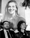 Leslie Mahaffy, 14, who was killed by Paul Bernardo in 1991, is seen in a photo behind her parents on Feb 21, 1993.