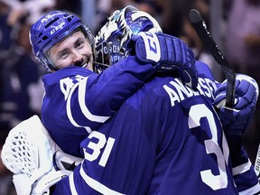 Toronto Maple Leafs centre Tyler Bozak and goaltender Frederik Andersen celebrate their Game 6 win over the Boston Bruins at the Air Canada Centre on April 23, 2018