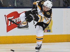 Brad Marchand of the Boston Bruins fires a shot against the Toronto Maple during Game 3 at the Air Canada Centre on April 16, 2018