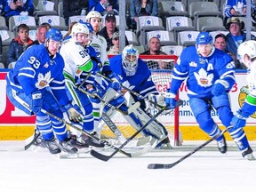 Marlies goalie Garrett Sparks follows a point shot from Utica’s Jonathan Dahlen on Sunday at Ricoh Coliseum. The Marlies won 4-0 to take the series in five games. (Christian Bonin/Photo)