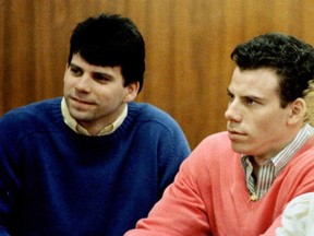 This 1992 file photo shows double murder defendants Erik (R) and Lyle Menendez (L) during a court appearance in Los Angeles. (MIKE NELSON/AFP/Getty Images)