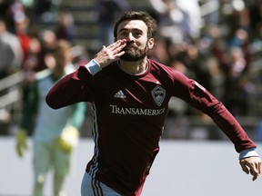 Colorado Rapids midfielder Jack Price celebrates after scoring a goal against Toronto FC in the first half of an MLS soccer match Saturday, April 14, 2018, in Commerce City, Colo. (AP Photo/David Zalubowski)