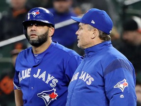 Kendrys Morales of the Toronto Blue Jays (left) has been placed on the 10-day disabled list. (ROB CARR/Getty Images)