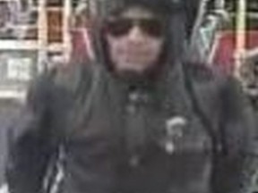 Security camera image of man wanted in assault on a TTC bus investigation.