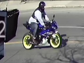 An image released by Toronto Police of a motorcycle and rider sought in a hit-and-run on Sunday, April 22, 2018 at Keele and Eglinton.