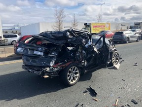 A vehicle damaged in a collision on Hwy. 401 at Winston Churchill on Thursday, April 19, 2019. (OPP_HSD)