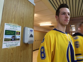 Mason Oates, co-captain of the Astros, the Ascension Collegiate hockey team at school in Bay Roberts, N.L. on Thursday, April 12 2018. Oates had decals honouring the Humboldt Broncos made for the hockey team to wear on their helmets. THE CANADIAN PRESS/Paul Daly