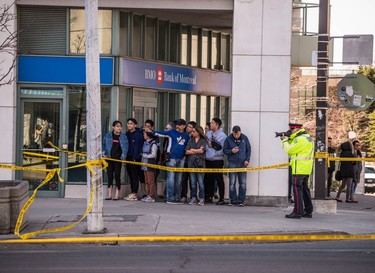 Emergency services close Yonge Street in Toronto after a van mounted a sidewalk crashing into a number of pedestrians on Monday, April 23, 2018. THE CANADIAN PRESS/Aaron Vincent Elkaim