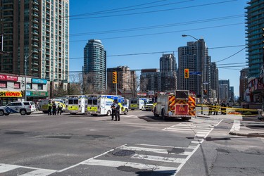 Emergency services close Yonge Street in Toronto after a van mounted a sidewalk crashing into a number of pedestrians on Monday, April 23, 2018. THE CANADIAN PRESS/Aaron Vincent Elkaim