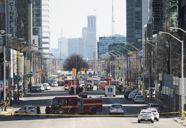 First responders close down Yonge Street in Toronto after a van mounted a sidewalk crashing into a number of pedestrians on Monday, April 23, 2018. THE CANADIAN PRESS/Nathan Denette