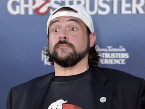 In a Saturday, July 9, 2016 file photo, Kevin Smith arrives at the Los Angeles premiere of "Ghostbusters" at the TCL Chinese Theatre.