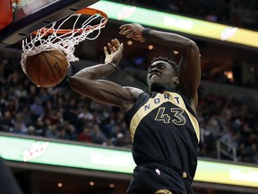 Toronto Raptors forward Pascal Siakam dunks during the first half of Game 6 of the team's NBA basketball first-round playoff series against the Washington Wizards, Friday, April 27, 2018, in Washington. (AP Photo/Alex Brandon) ORG XMIT: VZN102