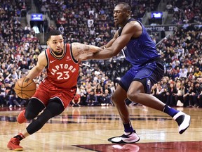 Toronto Raptors guard Fred VanVleet (23) drives past Orlando Magic centre Bismack Biyombo (11) during first half NBA basketball action in Toronto on Sunday, April 8, 2018. THE CANADIAN PRESS/Frank Gunn