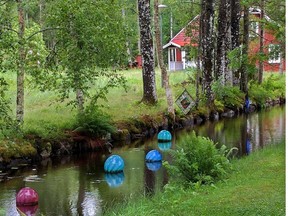 Sweden's rural Glass Country is filled with arty surprises. At one artisan's workshop, handblown glass baubles drift in a stream.SUZANNE KOTZ PHOTO  FOR RICK STEVES COLUMN