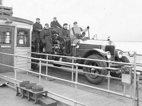 For many years, access to and from the new airport that had been built on the sandbar at the west end of Toronto Island (and had initially been called Port George VI Island Airport in anticipation of the Monarch’s visit to Toronto in 1939) was via this modified barge. The date of the photo is unknown as are the identities of the fellows crossing the Western Channel. Are they members of the Island’s volunteer fire department? Anyone recognize anyone?